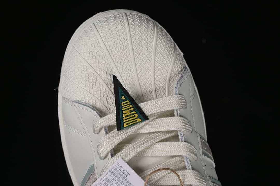 Close-up of textured shell toe and lace detail