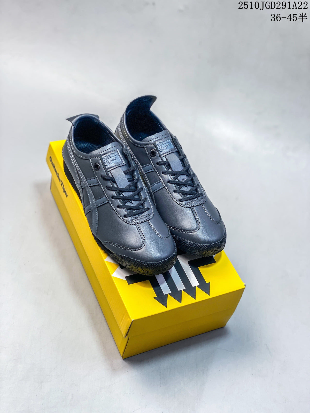 Pair of metallic gray Onitsuka Tiger low-top lace-up sneakers on a yellow box; image overlay shows 2510JGD291A22 and sizes 36–45.5.