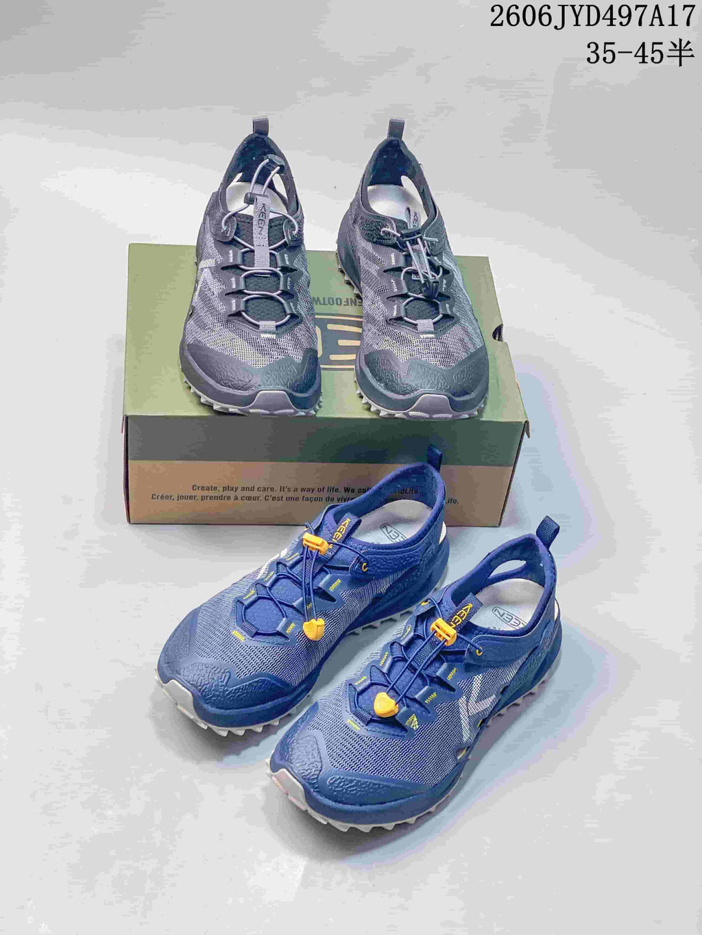 Gray and blue KEEN Zionic ADV hiking shoes shown together