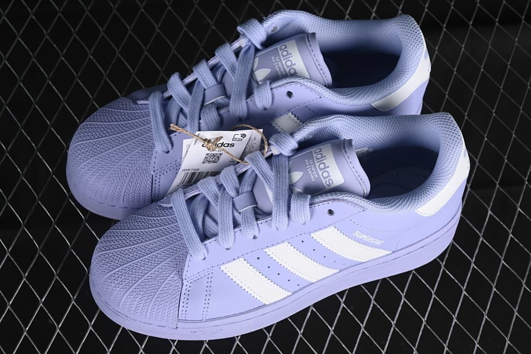 Pair of lavender Adidas Superstar XLG sneakers viewed from above