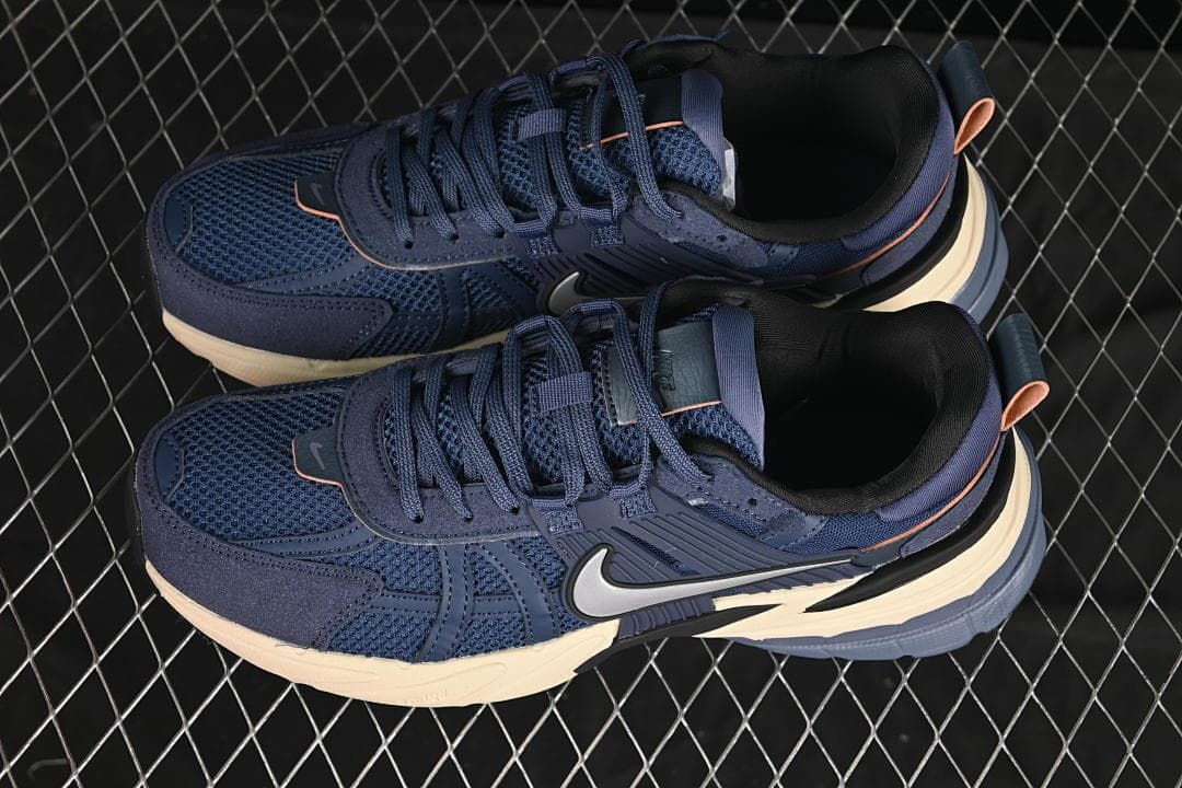 Pair of navy Nike V2K Run sneakers shown from above