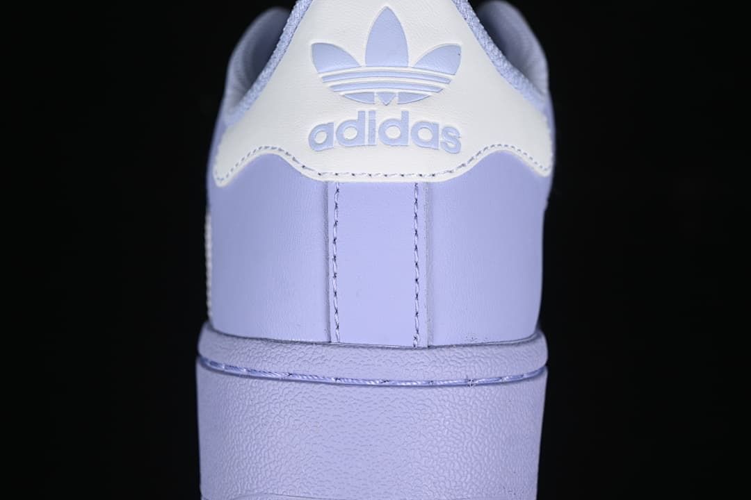 Rear view of the sneaker showing the heel tab and platform-style sole