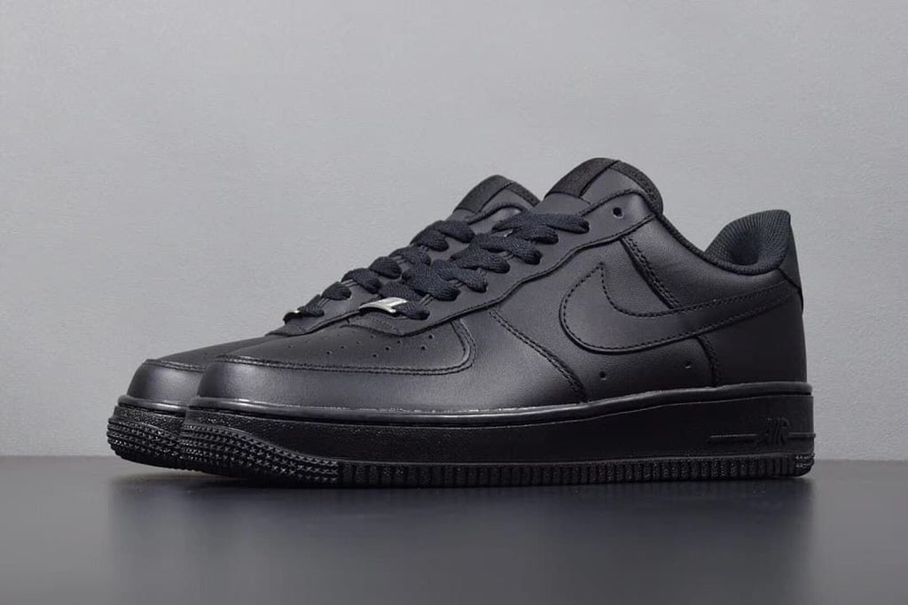 Angled front-side view of the black low-top sneaker