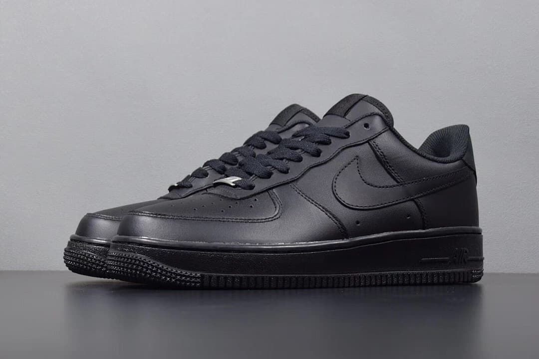 Angled front-side view of the black low-top sneaker