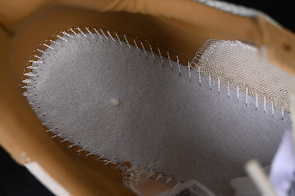 Close-up of the stitched interior lining and mesh panel