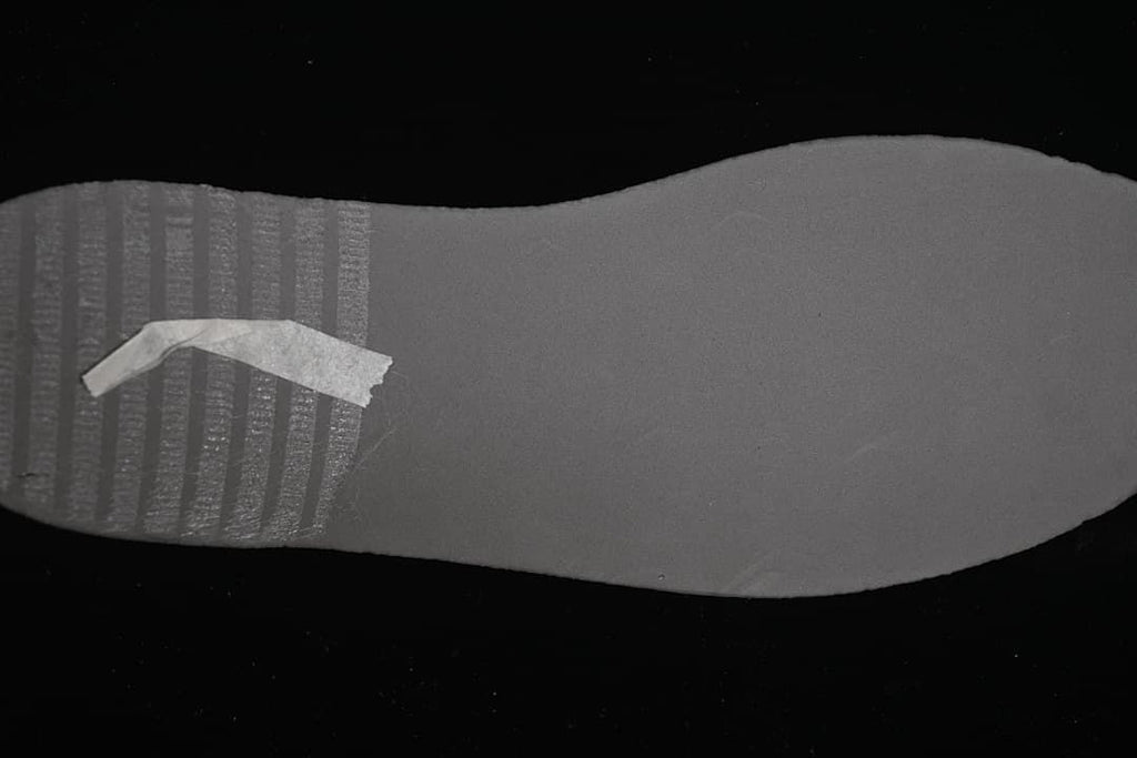 Close-up of the grey outsole tread