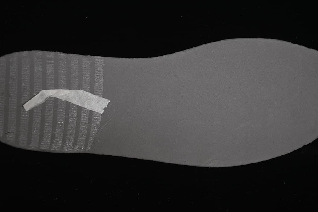 Close-up of the grey outsole tread
