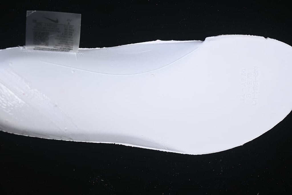 Close-up of the white shoe sole and interior size label