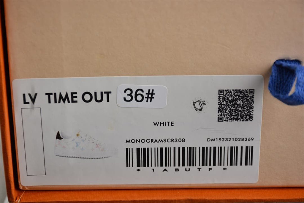 Box label identifying the shoe as LV Time Out, size 36, white