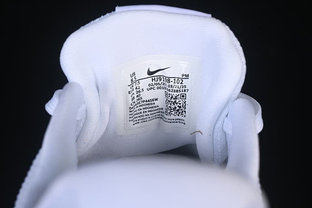 Close-up of the shoe tongue label showing style code HJ9198-102 and size information