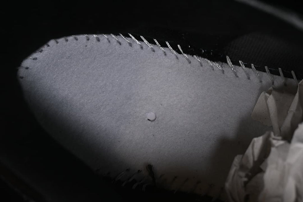 Close-up view of stitching inside the sneaker