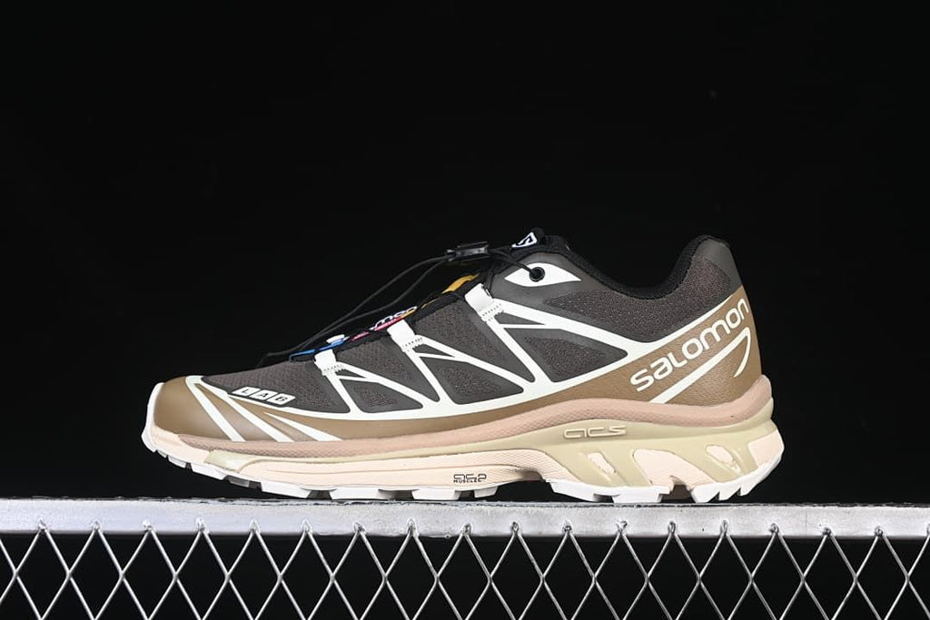 Side profile of one Salomon XT-6 Recuts sneaker in brown and black.