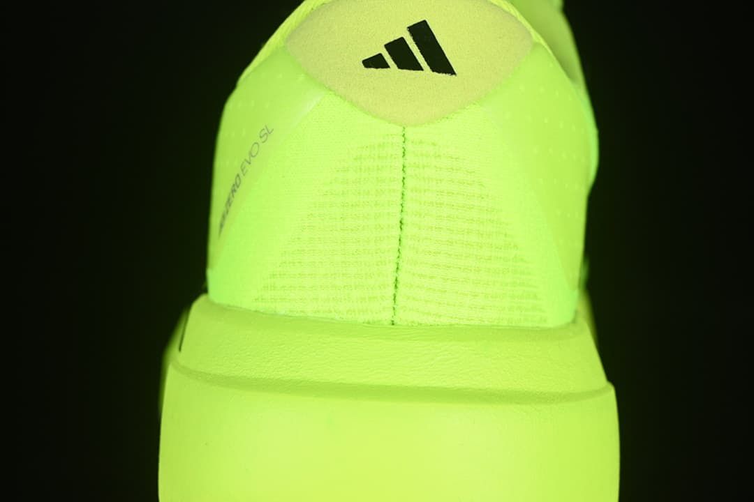 Rear view showing the Adidas heel logo and stitched upper.