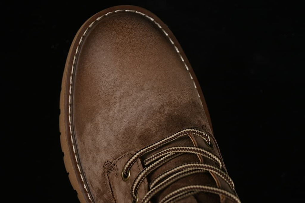 Top view of the rounded boot toe and laces