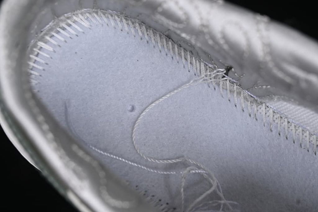 Macro view of interior stitching and construction details.