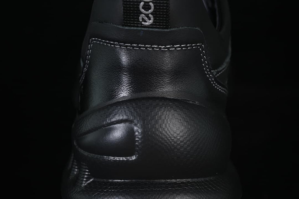 Close-up of the black heel counter and textured heel area