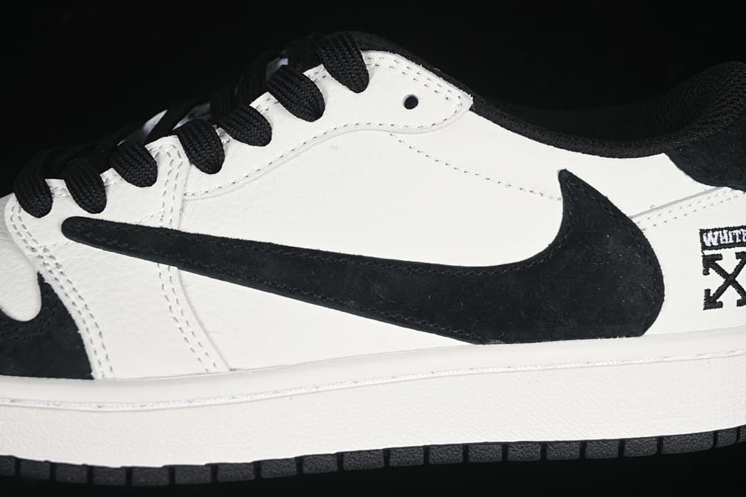 Close-up of the black side logo and white upper.