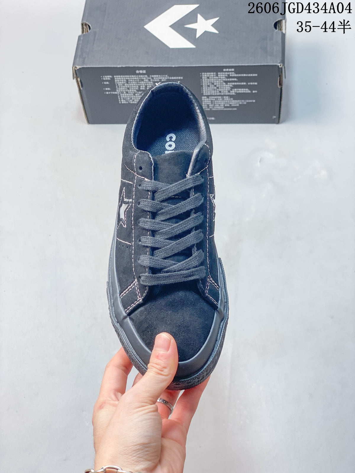 Front view of the dark blue Converse One Star Pro with lace-up closure.