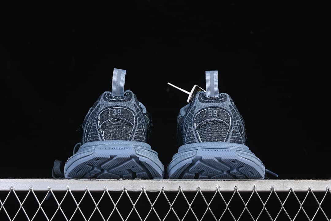 Rear view of both shoes showing heel details and outsoles