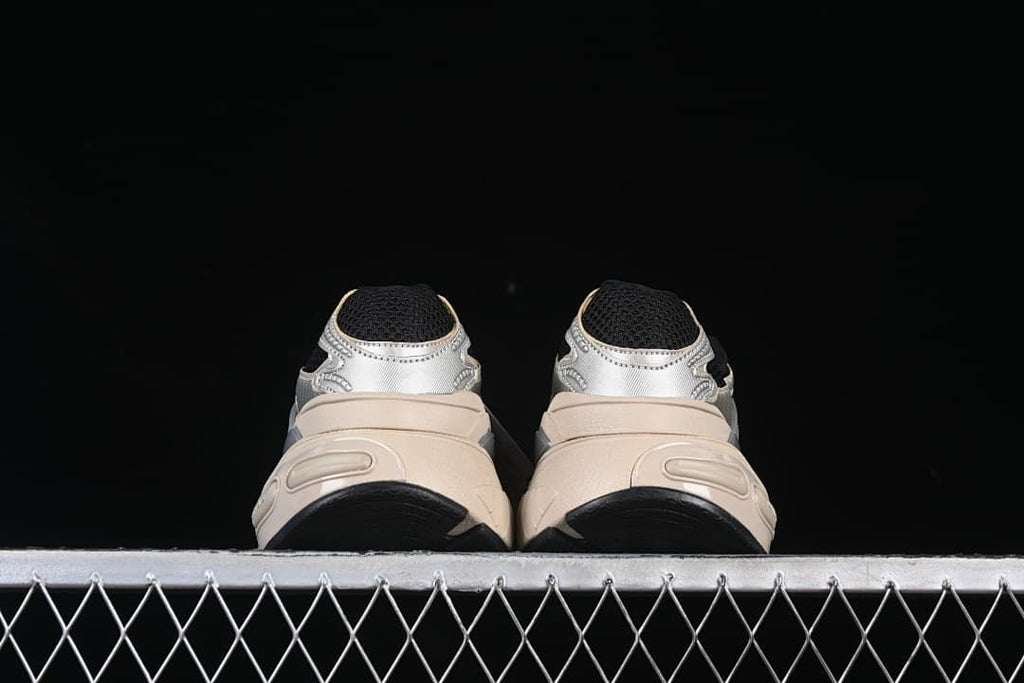 Rear view showing heel details and outsole edges