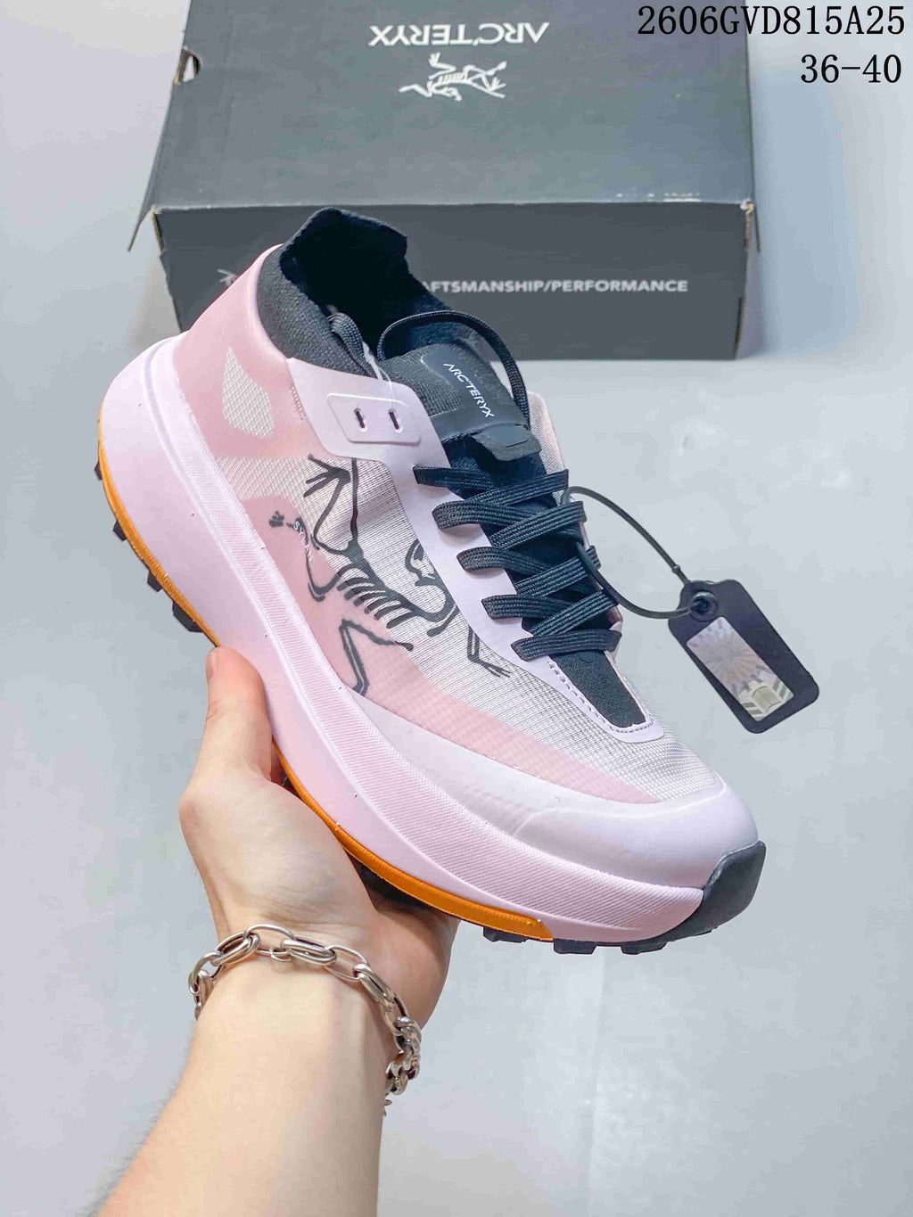 Side view of a pink Arc'teryx KNORVAN SY shoe.