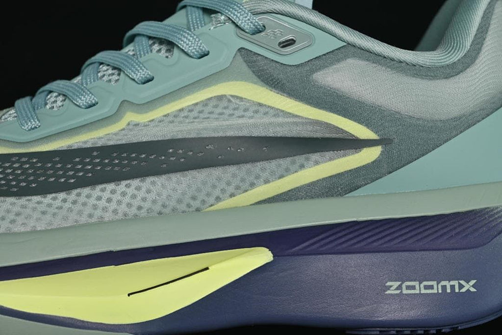 Close-up of side Swoosh, pale yellow trim, and ZoomX marking