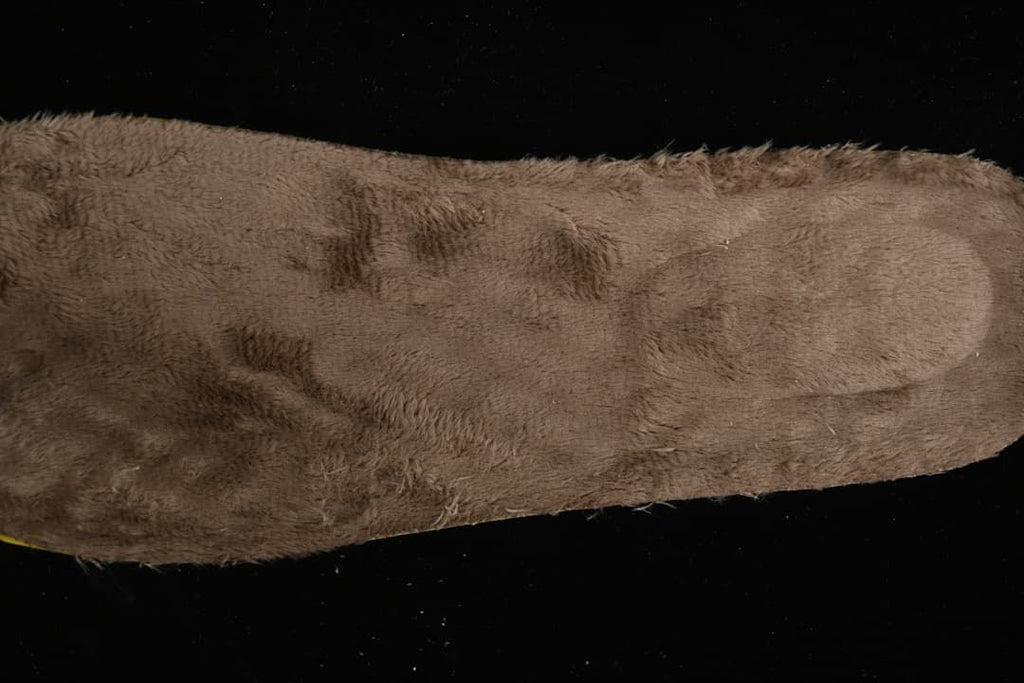 Close-up showing the plush-looking brown boot lining
