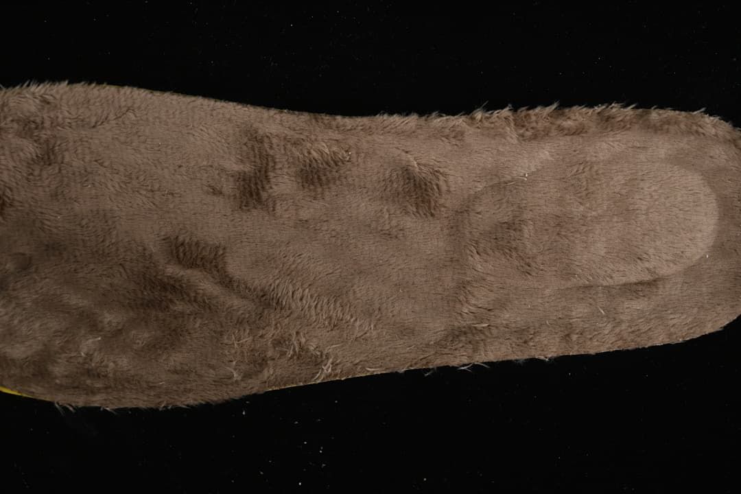 Close-up showing the plush-looking brown boot lining