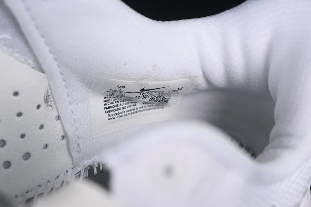 Close-up of the shoe tongue label and inner lining.