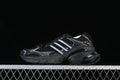 Side view of a black adidas Adistar XLG sneaker with silver accents
