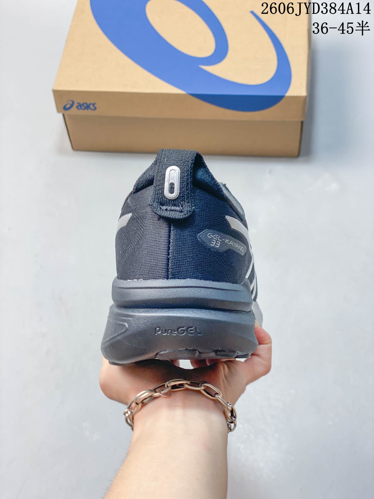 Rear view of the shoe showing GEL-KAYANO 33 branding and a thick midsole