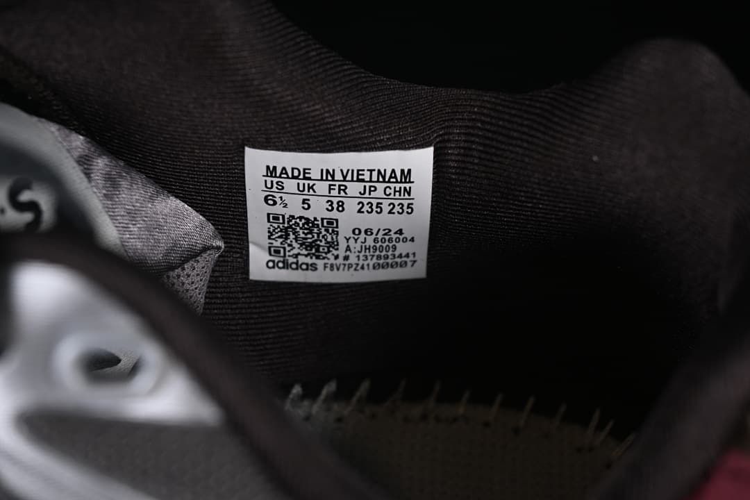 Interior shoe size label showing US 6.5, UK 5, FR 38, JP 235, and CHN 235.