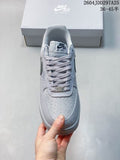Top view of a light Nike Air Force 1 '07 LV8 sneaker showing the perforated toe, laces, tongue branding, and shoebox.