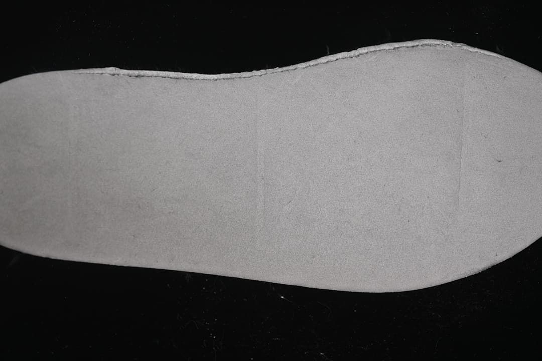 Close-up of the pale-colored sole surface