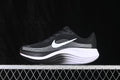 Side view of a black Nike Journey Run shoe with white side detailing and a thick black-and-white sole