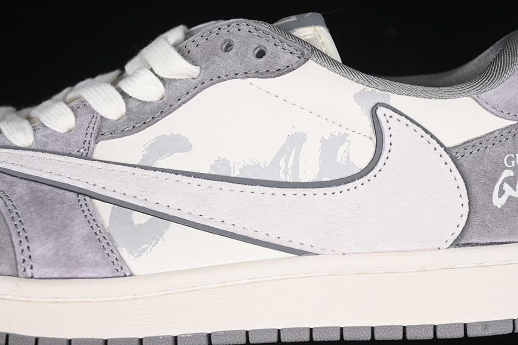 Close-up of the side Swoosh, gray overlays, and graphic panel