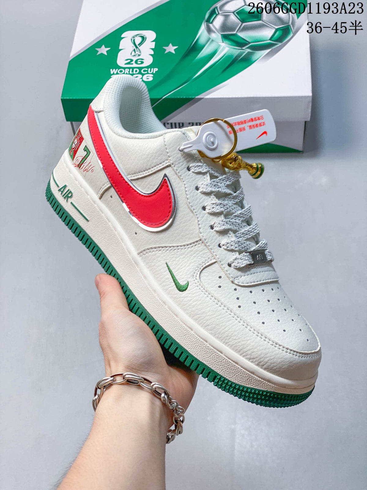 Angled view of the sneakers showing Portugal-themed graphics and red and green accents
