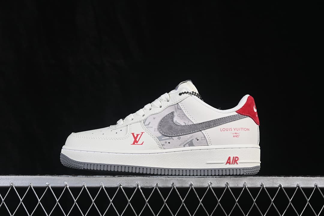 Side profile of the off-white sneaker with gray and red details