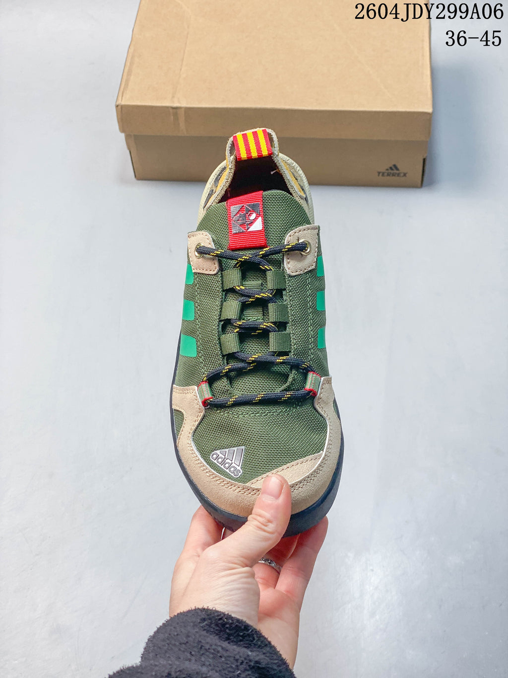 Top view showing the lace-up front, green upper and beige toe overlay