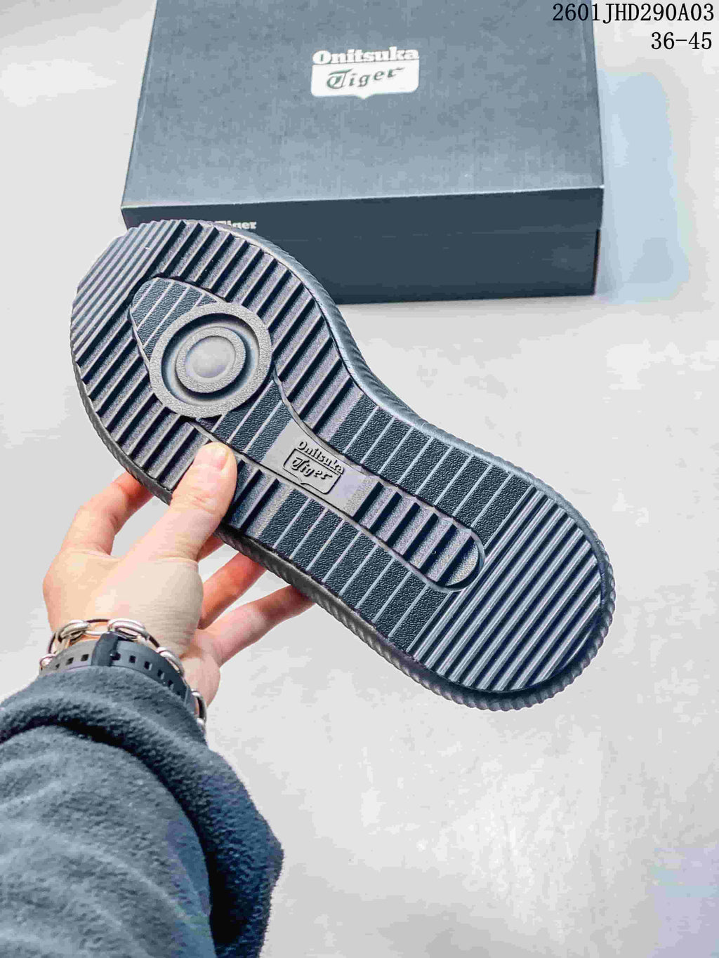 Underside of the sneaker showing a ribbed outsole and tread pattern