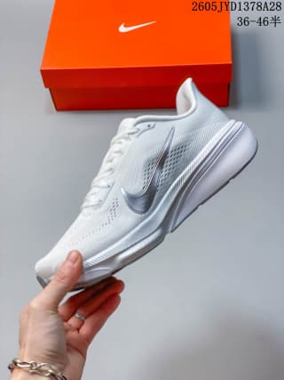 Opposite side view of a white and light gray Nike Air Zoom Pegasus 42 shoe.