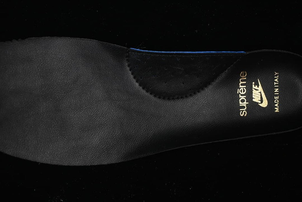 Black insole with Supreme and Nike branding