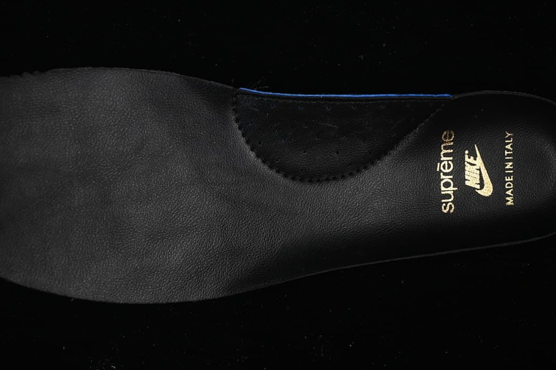 Black insole with Supreme and Nike branding