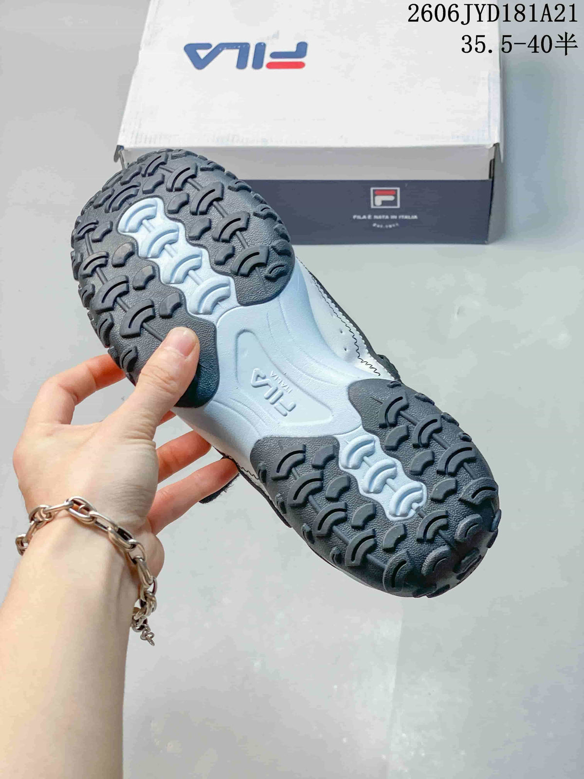 Close-up of the FILA Pebble sandal outsole and raised tread.