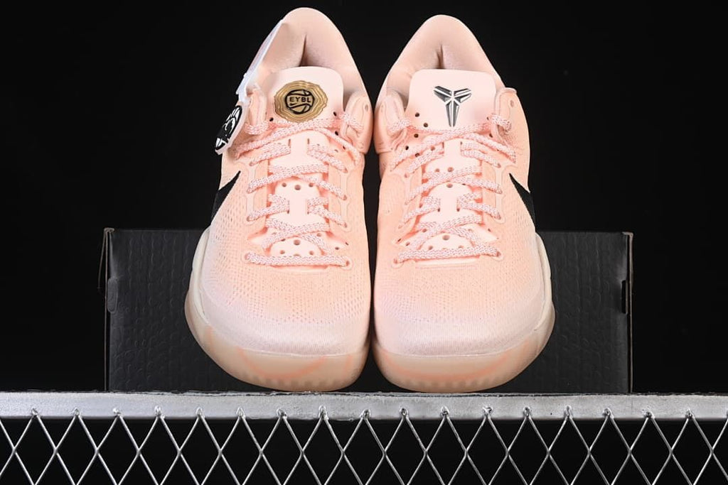 Front view of both pink basketball shoes