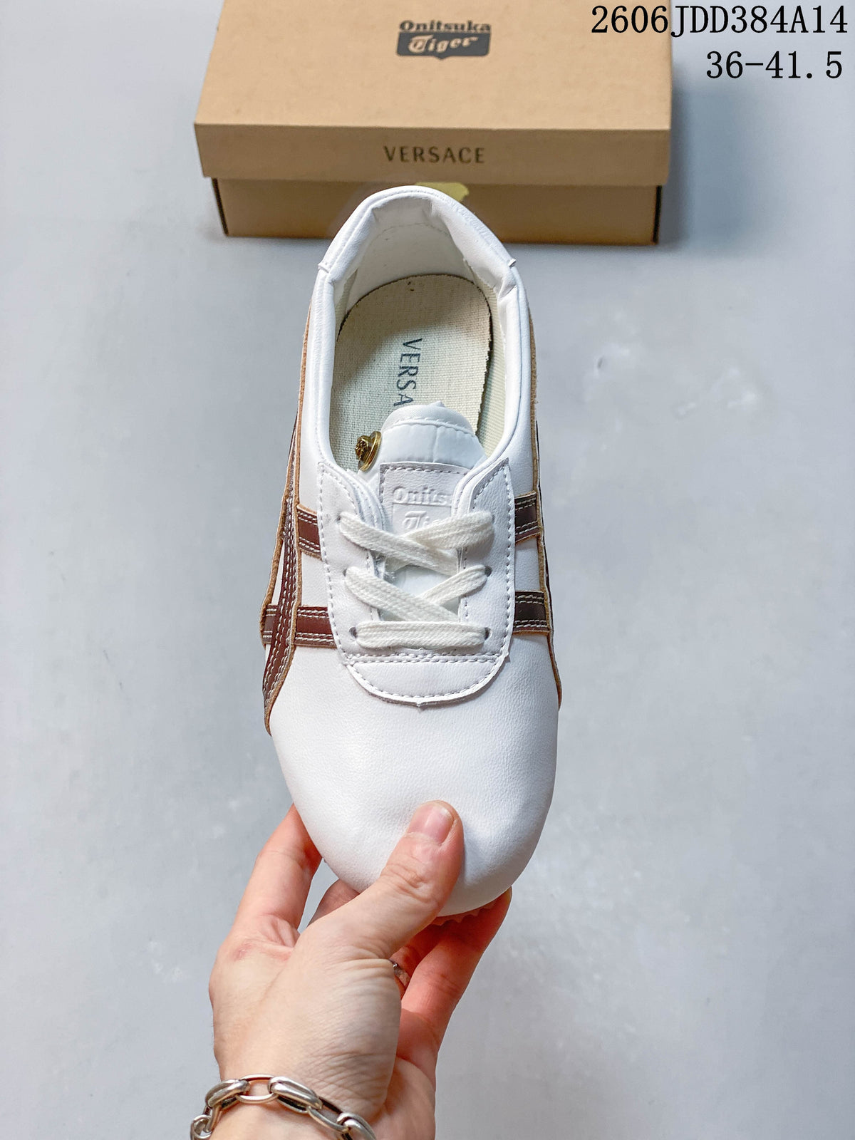 Top view showing the rounded toe, white laces, and brown side stripes