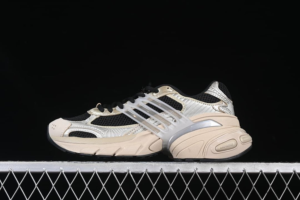 Side view of the adidas Adistar XLG in silver, beige and black