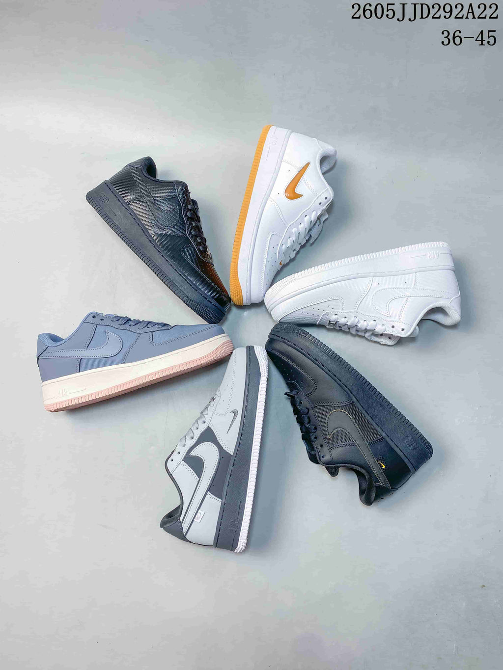 Several low-top sneaker color variations arranged in a circle.