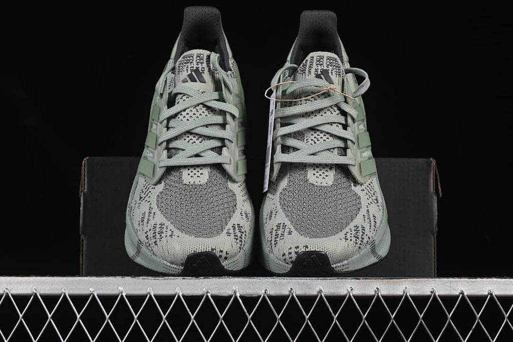 Front view of the pair showing the patterned toe and lace-up design