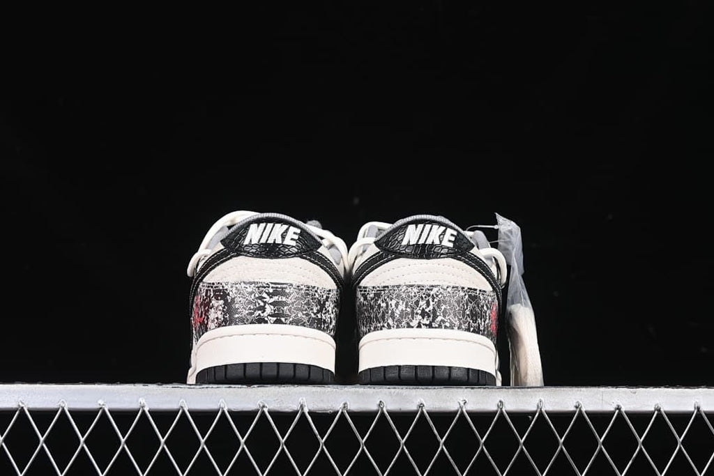 Rear view of both sneakers showing patterned heel panels